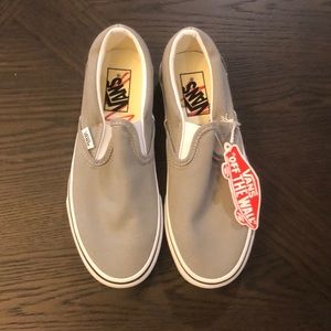 Vans grey slip ons. Women's size 7, men's size 5.5